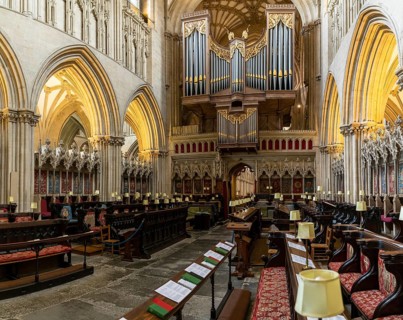 Wells, United Kingdom, 1 September, 2022: view of the Choir and the church organ inside the