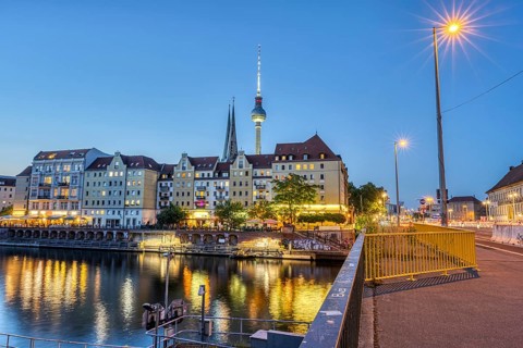 The Nikolai quarter, the Spree and the television tower in Berlin at dusk