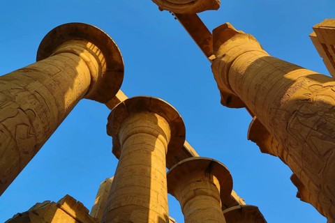 Top of columns in Karnak temple with ancient egypt hieroglyphics