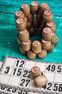 Traditional legacy of the ancient Board game Lotto on wooden background