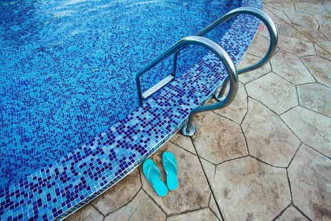 Swimming pool in the resort. View from water