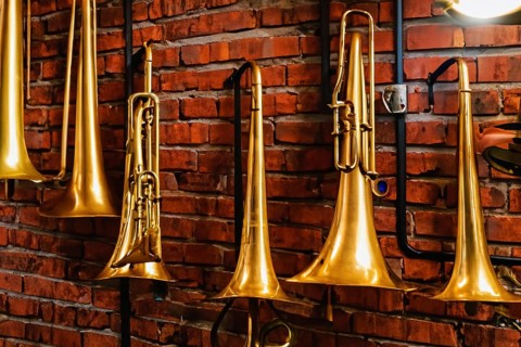 Interior of an old musical workshop with musical instruments and tools