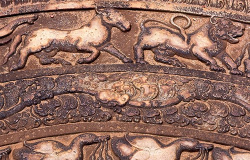 Sandakada pahana is an elaborately carved semi-circular stone slab, usually placed at the bottom of