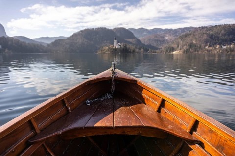 Wooden rent boat on a Bled lake, famous tourist destination in Slovenia