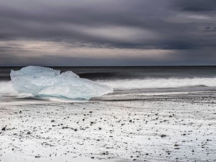 Diamond Beach, iceberg in the surf on the black lava beach, near Jökulsarlon glacier lagoon,