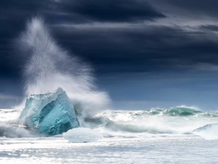 Diamond Beach, iceberg in the surf, near Jökulsarlon glacier lagoon, Vatnajökull National Park,