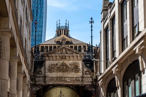 London, UK, May 14, 2019: Low angle view of the entrance to Leadenhall Market. Originally a meat,