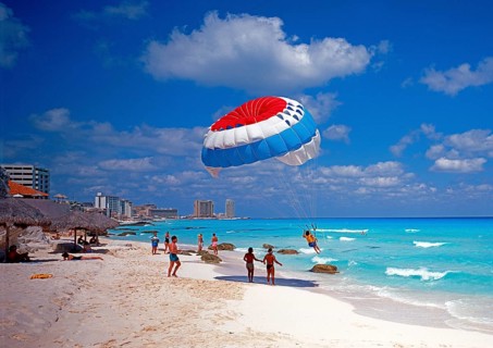 Parasailing on the beach in Cancun, Mexico, Central America