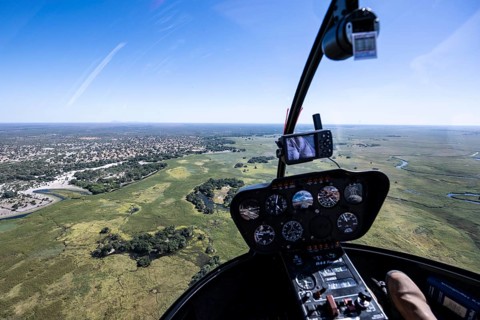 Okawango Delta Pfannenstil, Helicopter cockpit over the Okawango Delta, aerial view, Botswana,