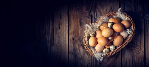Fresh eggs straight from the farm in a basket
