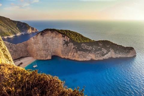 The magical island of Zakynthos on the Mediterranean. The cove with a small sandy beach. The sky