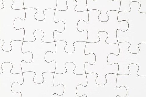 Blank puzzle pieces in detail