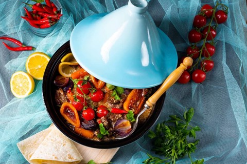 Delicious spicy beef cooked with various vegetables in tagine