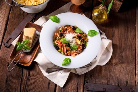 Ribbon Pasta with courgette and olives in tomato sauce