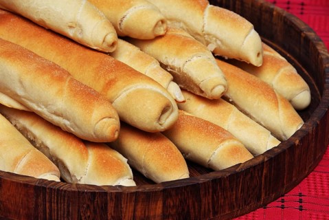 Heap of appetising homemade bread rolled loafs