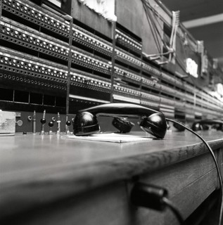 Telephony in the 1970s. Interior from an empty room with a large switchboard visible. Technology of