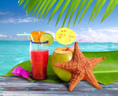 Coconuts cocktails straw tropical caribbean beach with starfish