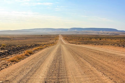 Gravel road to the Fish River Canyon, south of Namibia, Africa. Dry season