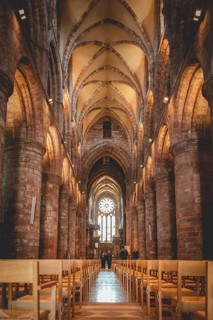 Illuminated Inside of St Magnus Cathedral at Kirkwall, Scotland, vertical shot