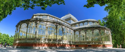 Panorama of Palacio de Cristal (Glass Palace) in Buen Retiro Park in Madrid, Spain, Europe