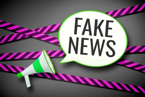 3D illustration of a megaphone and a speech bubble with the message fake