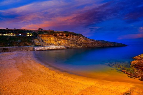 Llanes Playa del Sablon beach sunset in Asturias of Spain