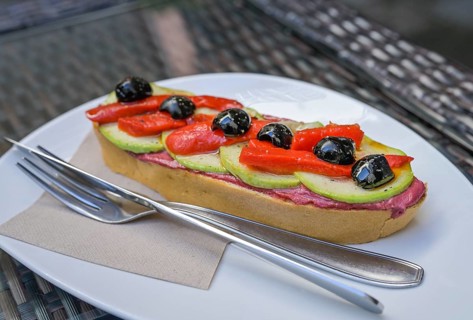 Bread with olives, peppers, avocado and beetroot, tapas in Tenerife, Spain, Europe