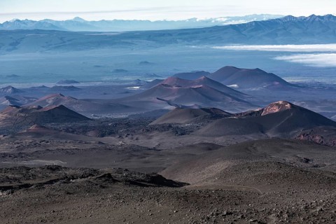 Beautiful volcano landscape of Kamchatka Peninsula: series of cinder cones and lava fields of