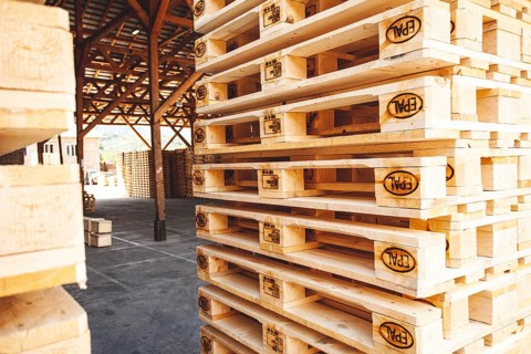 Kyiv, Ukraine - September 20, 2019: Close up of Piles of EPAL pallets outdoors