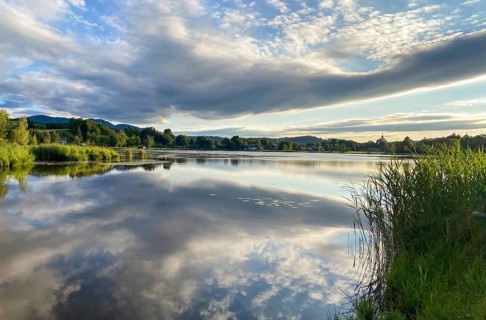 Scenic sky above the lake of Bad Bayersoien in the Bavarian Alps, Germany, Europe