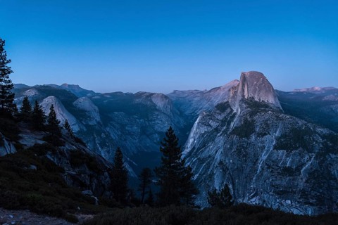 Scenic night sky above the famous Half Dome mountain, Yosemite NP, USA, North America