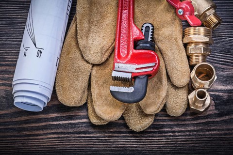 Protective gloves monkey wrench construction drawings brass plumbing fittings gate valve on wooden