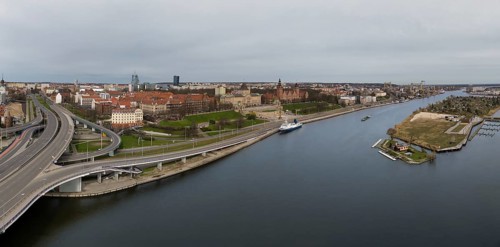 Aerial view of Chrobry Shafts, moored ships on the Oder River and castle like buildings of National