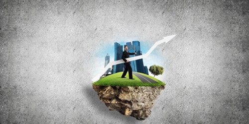 Conceptual image of young and confident business man in suit holding big white arrow in hands while