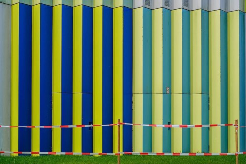 Colourful façade of the Mira shopping centre on the Nordhaide in Munich