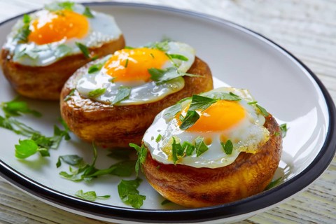 Tapas mushrooms with quail eggs from Spain pinchos pintxos