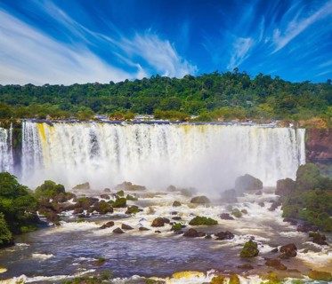 Incredible exotic waterfalls of Iguazu on the border of Brazil, Argentina and Paraguay. Concept of