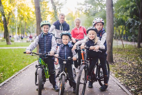 Theme family sports holiday in park in nature. big friendly Caucasian family of six people mountain