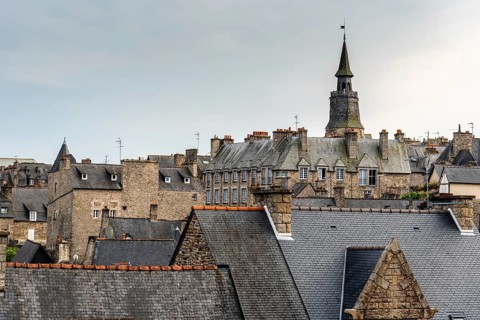 High angle view of Dinan with old cobblestoned streets and stone medieval houses, French Brittany