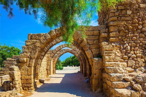 Superbly preserved ancient arched ceiling of stalls. National park Caesarea on the Mediterranean.