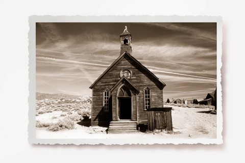 This small chapel made of weather-beaten boards stands on the edge of a dusty road in Bodie. Photo