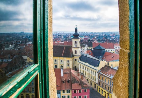 Suning view to Sibiu historic center and Holy Trinity Roman Catholic Church viewed from the