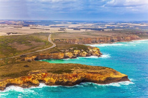 Scenic coastline. Picture taken from a helicopter. Great Ocean Road and the Twelve Apostles is a