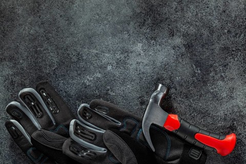Gloves And Mini Safety Claw Hammer Coposed With Copy Space