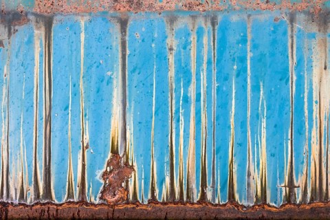 A rusty panel is transformed into a work of art