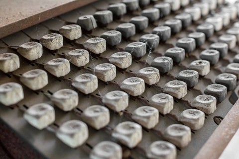Details of an old keyboard on industrial machine of the late nineteenth century