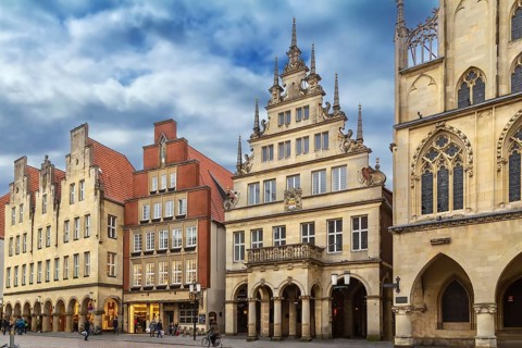 Prinzipalmarkt is historic street with buildings with picturesque pediments attached to one another