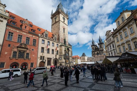 PRAGUE, CZECHIA - MARCH 25, 2023. Old Town Hall astronomical clock and old town.