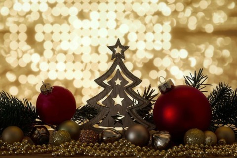 A Christmas symbols decoration red glass balls and bokeh lights