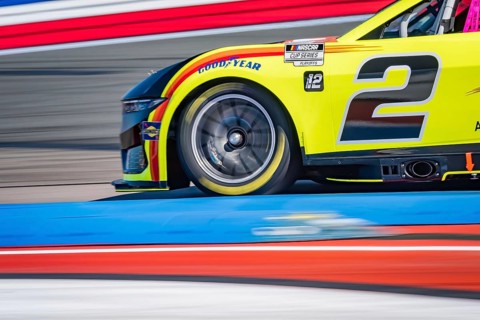 NASCAR Cup Series driver, AUSTIN CINDRIC (2), races through the turns during a practice session for